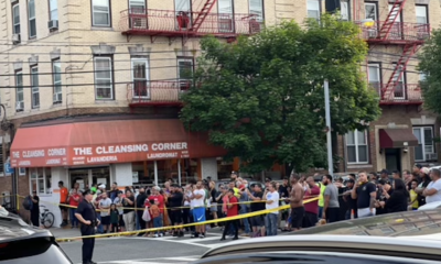 Crowd gathers outside after shootout with the police in West New York, New Jersey
