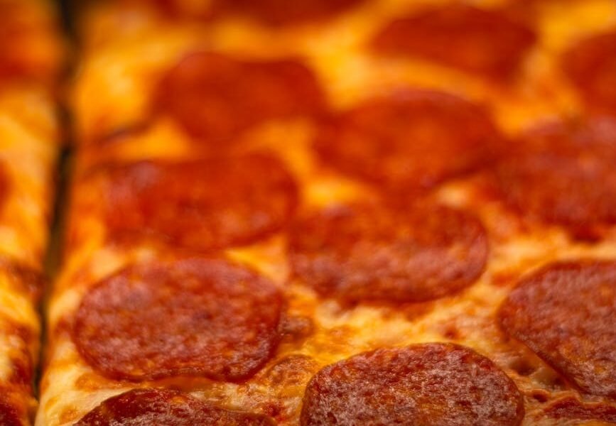 delicious pepperoni pizza slice in toronto pizzeria